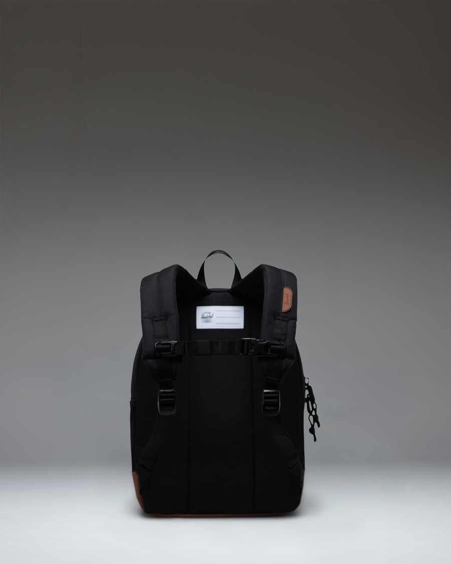 Herschel Heritage Kids Backpack in Black with Saddle Brown rubber diamond accent and detailing.