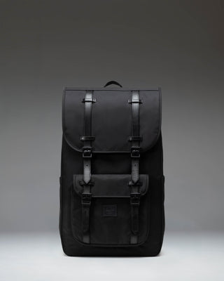 Black Herschel Little America Backpack featuring a classic mountaineering design with magnetic strap closures and a front pocket.