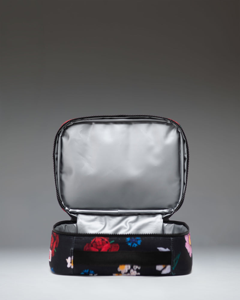 Herschel Supply Co. LEGO Pop Quiz Lunch Box in Falling Florals floral print.