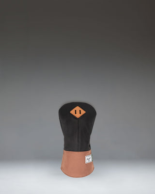 Herschel Heritage Driver Head Cover in Black and Saddle Brown, showing a classic design with a synthetic leather bottom and fabric top.