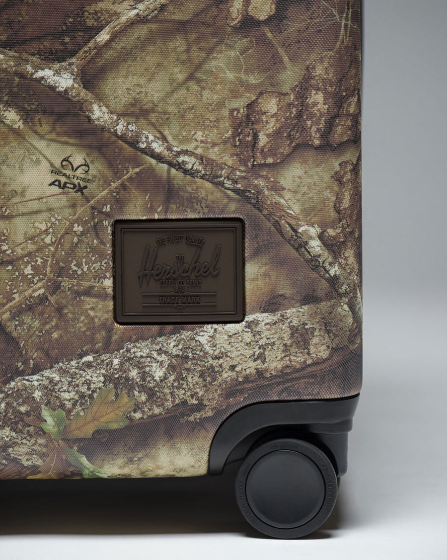 Herschel Heritage Large Luggage in Realtree APX Camo.