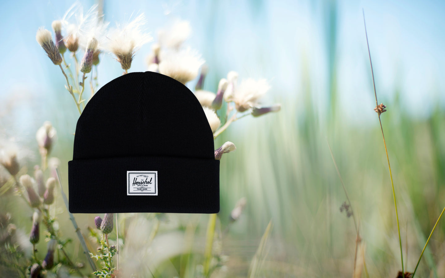 Herschel Supply Co. product featured in a lifestyle hero banner image.